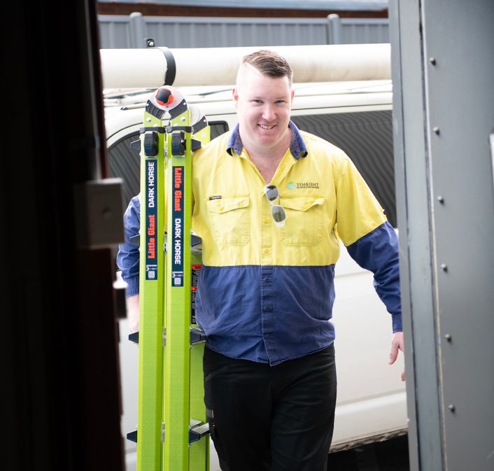 Professional Symbient Electrician With Ladder Ready For Work